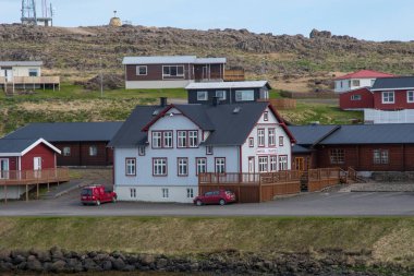 Djopivogur Iceland - May 25. 2018: Hotel in town of Djupivogur in East Iceland clipart