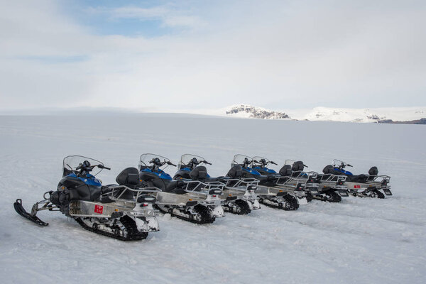 Vatnajokull Iceland - September 22. 2018: Yamaha snowmobiles from tour company Glacier Journey lined up on Skalafellsjokull glacier
