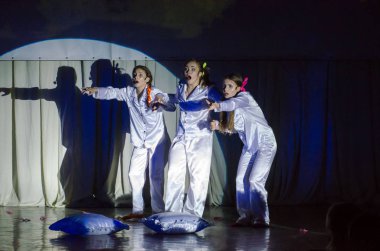 DNIPRO, UKRAINE - JUNE 22, 2018: Grand Show Song on Bis perfomed by members of the Creative Youth Song Theater. clipart