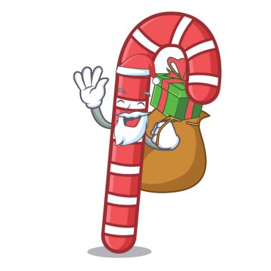 Maskot karikatür vektör çizim Noel Hediyelik şeker ile köpekler