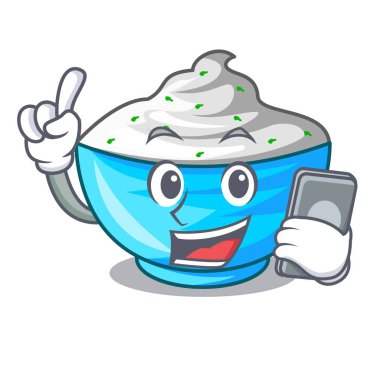 Bir cam kase karikatür ile telefon ekşi krema