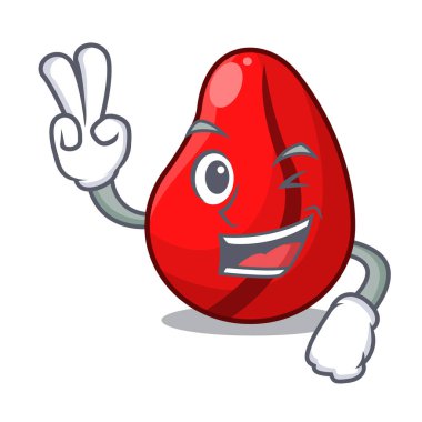 İki karakter bütün kurutulmuş kola cevizi üzerinde parmak