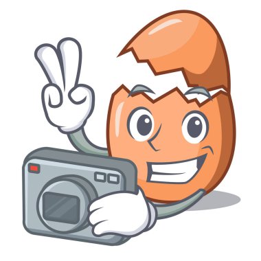 Maskot kırık yumurta kabuğunun fotoğrafçı