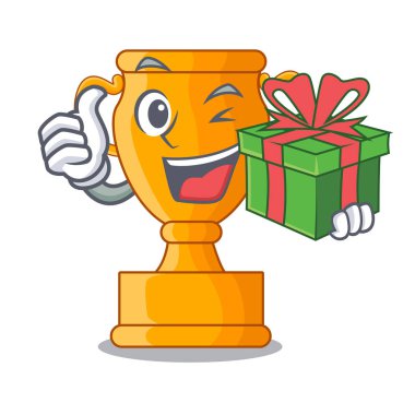 Hediye şampiyon altın kupa ile karikatür masada