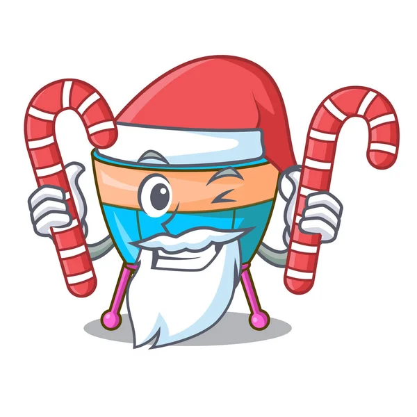 Santa con dulces timbales de dibujos animados aislados en la mascota — Vector de stock