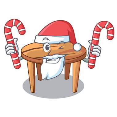 Santa ile şeker ahşap masa üzerinde maskot izole