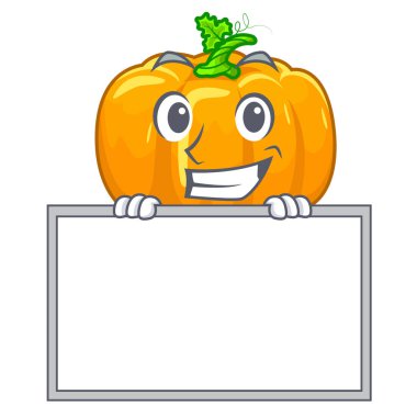 Ahşap maskot tablonun üst kurulu sarı kabak ile sırıtarak