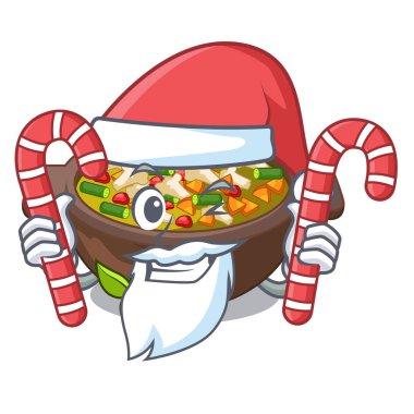 Maskot masanın üzerinde şeker minestrone plaka ile Santa
