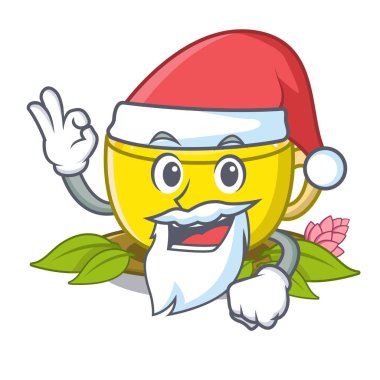 Maskot ahşap masa üzerinde Santa zerdeçal çayı