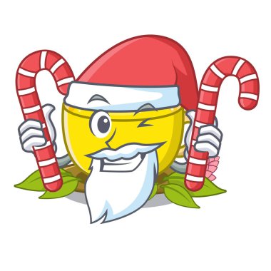 Maskot ahşap masa üzerinde şeker zerdeçal çayı ile Santa