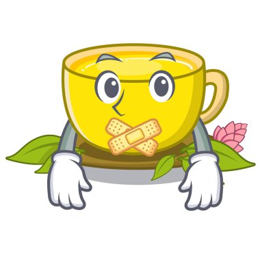 Maskot ahşap masa üzerinde sessiz zerdeçal çayı