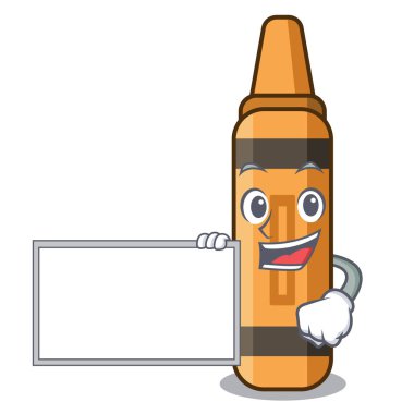 Maskot kitabının üstünde turuncu boya kalemi olan.