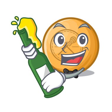 Tahta çizgi film masasının üstünde bira lekros topu var.