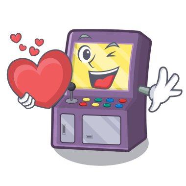 Maskot masasının yanındaki kalp atari makinesiyle.