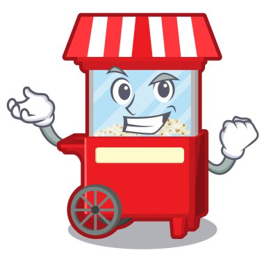 Karikatür masasının yanındaki başarılı patlamış mısır makinesi