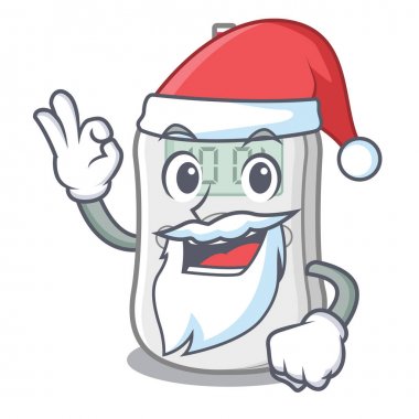 Maskot masanın üzerinde Santa diyabet kontrol makinesi