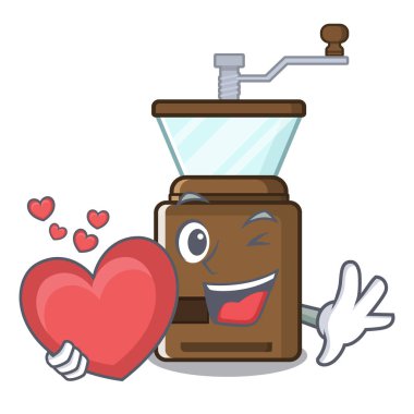 Ahşap masa üzerinde kalp karikatür kahve öğütücü ile