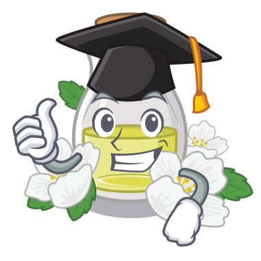 Mezuniyet yasemin yağı şişesi maskot masanın üzerinde