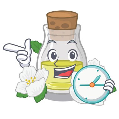 Maskot masanın üzerinde saat yasemin yağı şişesi ile