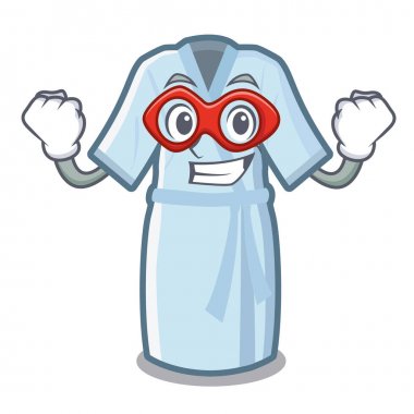 Süper kahraman bornoz maskot masanın üzerine yerleştirilir