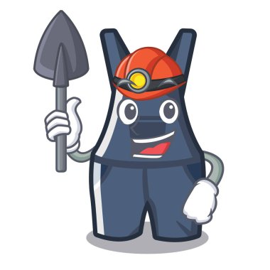 bir karikatür duvarında asılı tulum