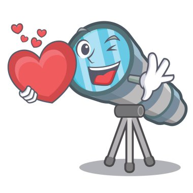 Karakter tablosunun üzerinde kalp minyatür teleskop ile