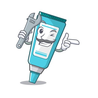 Maskot ahşap masa üzerinde mekanik merhem