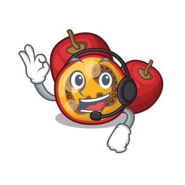 Maskot ahşap masa üzerinde kulaklık meyve tamarillo ile