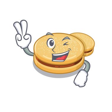 Karikatür şeklinde iki parmak alfajores