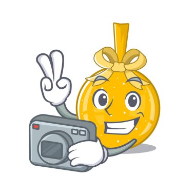 Fotoğrafçı bir karakter üzerinde altın bir balo.