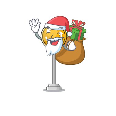 Noel Baba, maskotun önünde minyatür bir döner kavşak yapıyor.