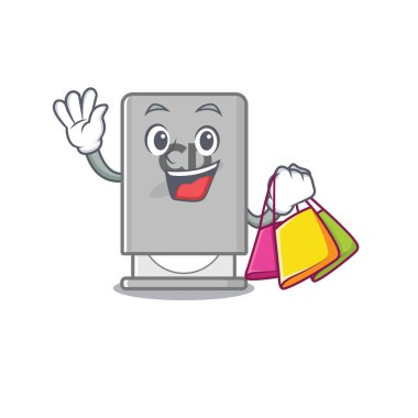 Maskot ahşap masanın üstünde alışveriş gezisi.