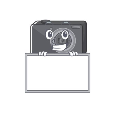 Çizgi film şeklindeki dijital kamerayla sırıtarak.