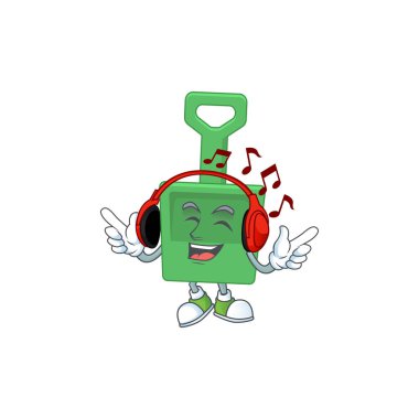 Çizgi film tasarımı yeşil kum kovası kulaklıkla müzik dinliyor.