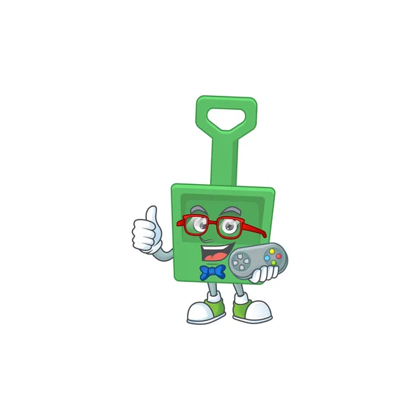 Cartoon mascot design of green sand bucket play a game with controller — Stock Vector