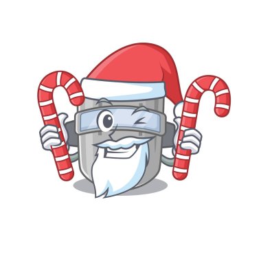 Noel Baba çizgi film karakteri kılığındaki dostane kaynak maskesi ve Noel şekeri.