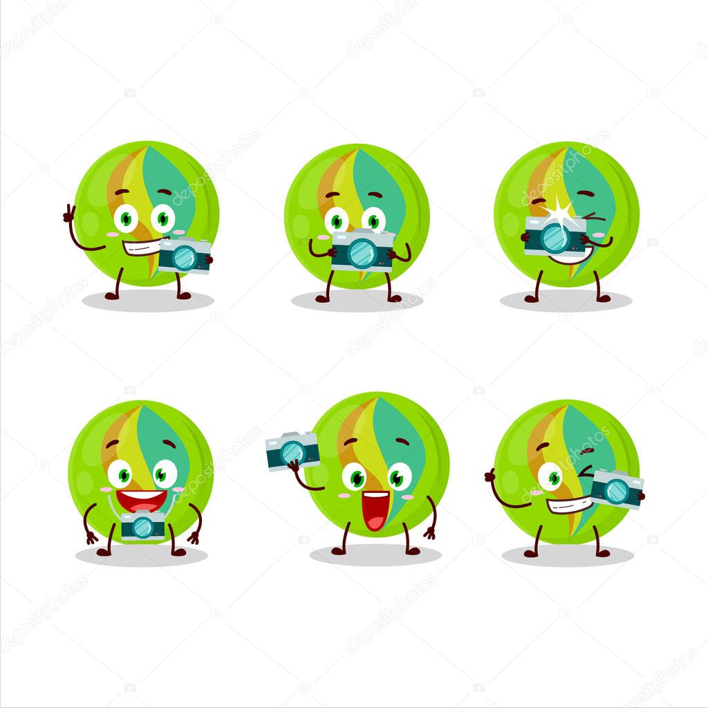 Photographer profession emoticon with green marbles cartoon character