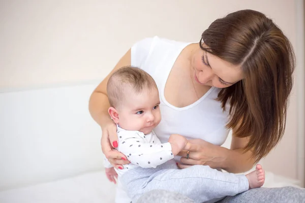 Young Mother Playing Her Happy Baby Home — Stock Photo, Image