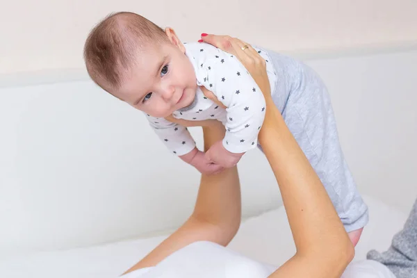 Young Mother Playing Her Happy Baby Home — Stock Photo, Image