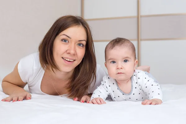Young Mother Playing Her Happy Baby Home — Stock Photo, Image