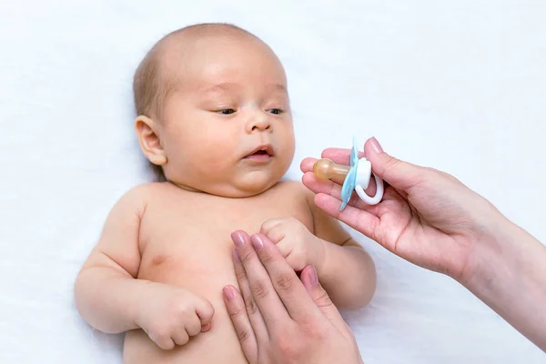 Mother Hand Giving Pacifier Her Newborn Son — Stock Photo, Image