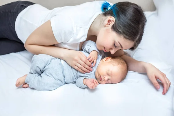 Young Happy Mother Kissing Her Newborn Son — Stock Photo, Image