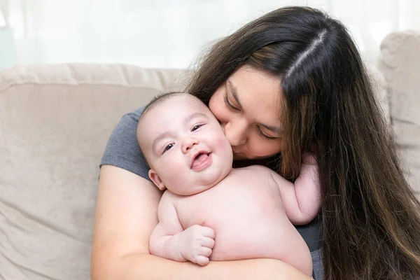 Mother Holding Kissing Her Cute Infant Son — Stock Photo, Image