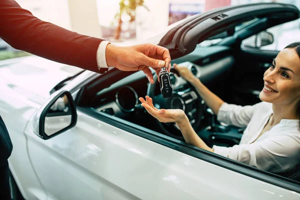 Attractive Young Woman Sitting Car Male Hand Giving Her Key — Stock Photo, Image