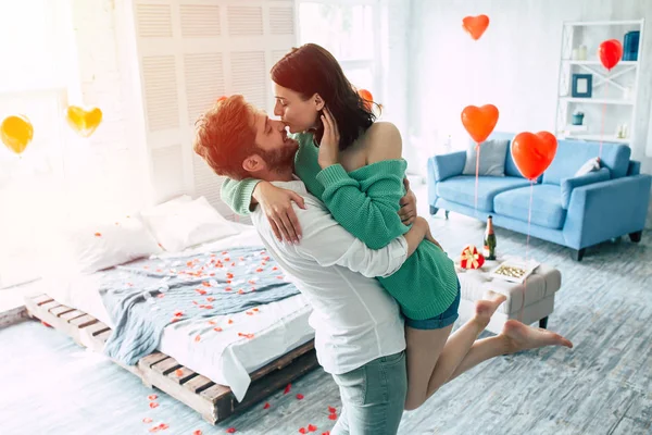 Young Man Holding Woman Arms Bedroom — Stock Photo, Image