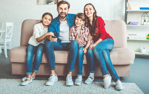 Young family spending happy time at home 