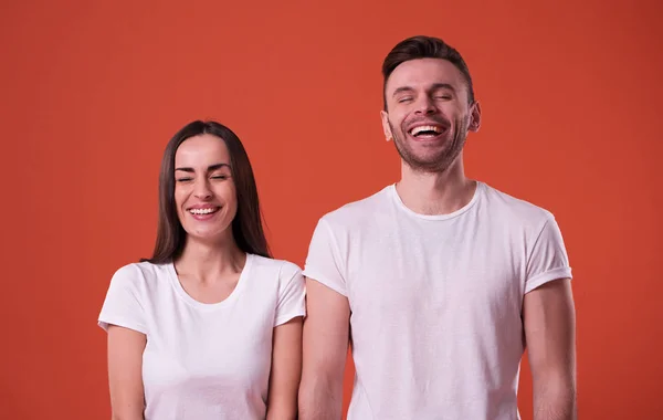 Beautiful Young Couple White Blank Shirts Posing Orange Background Relationship — Stockfoto