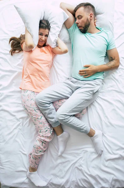 Stressed Angry Woman Covering Her Ears Help Pillow Due Snoring — Stock Photo, Image