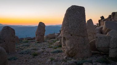 Commagene statue ruins on top of Nemrut Mountain in Adiyaman, Turkey. Stone heads at the top of 2150 meters high Mount Nemrut. Turkey clipart