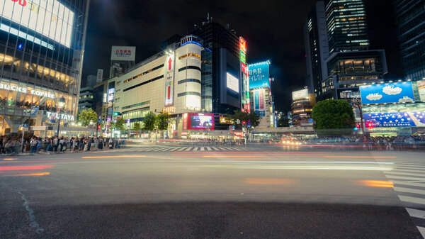 Tokyo, Japan - August 2018: Long exposure photo of Shibuya Crossing with light trails of cars